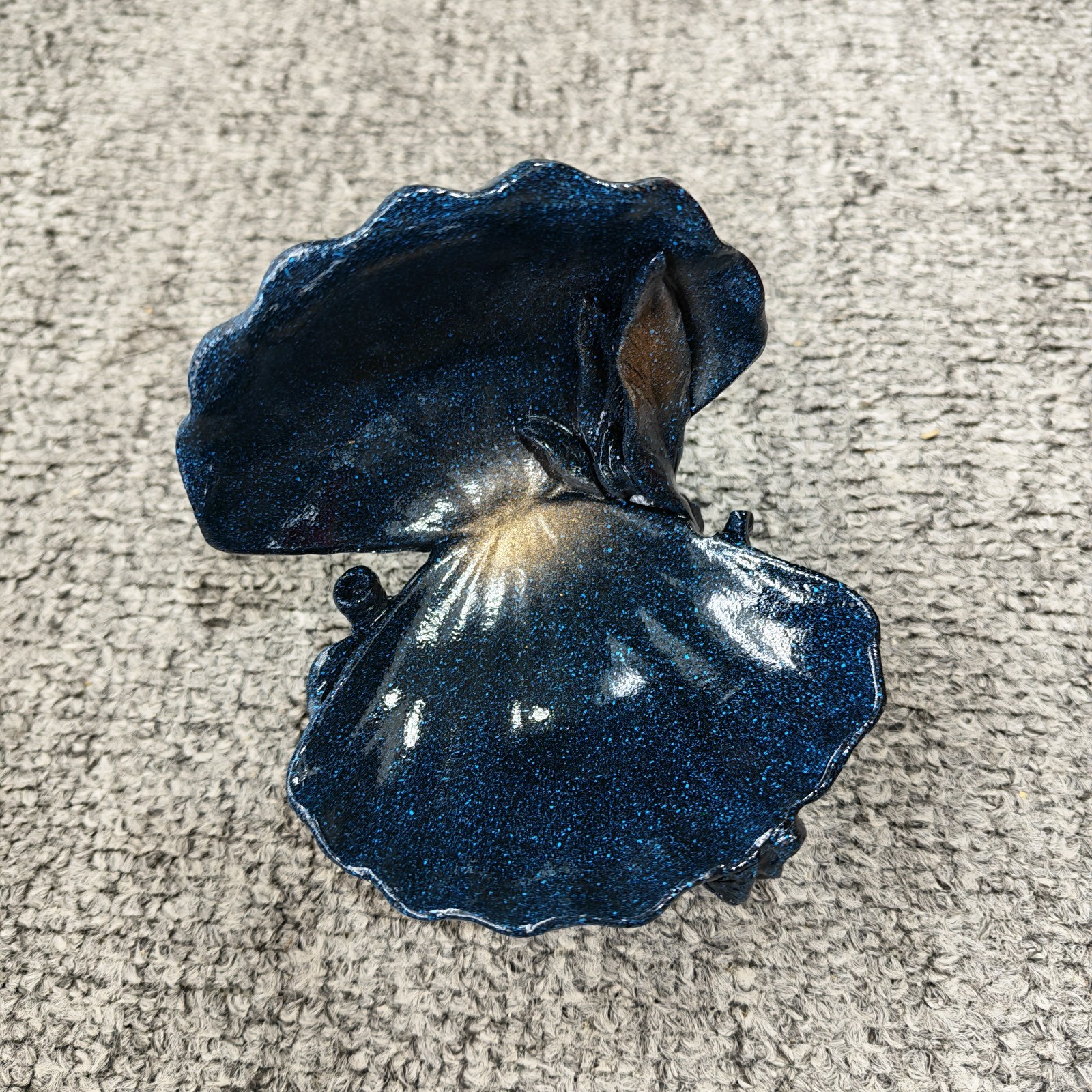 dark blue clamshell stand for natural crystal sphere