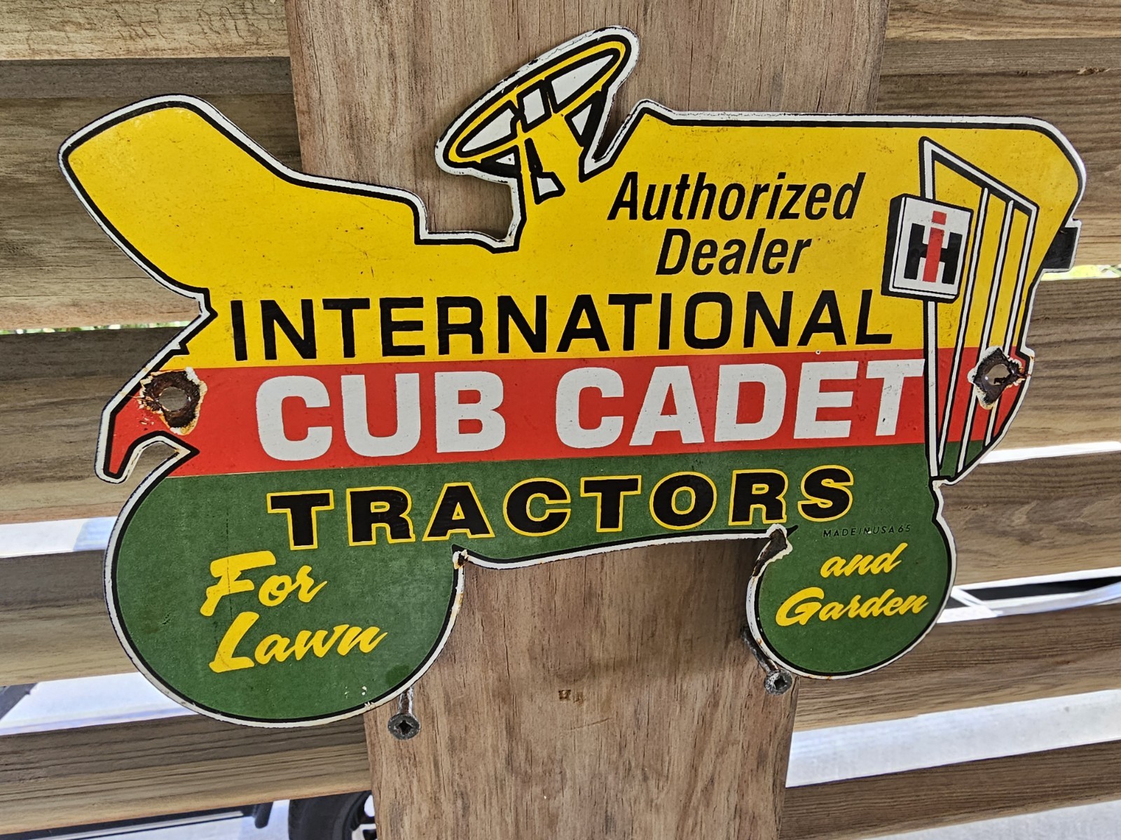 VINTAGE INTERNATIONAL CADET TRACTOR HEAVY DUTY FARM PORCELAIN SIGN 10″X6.5″