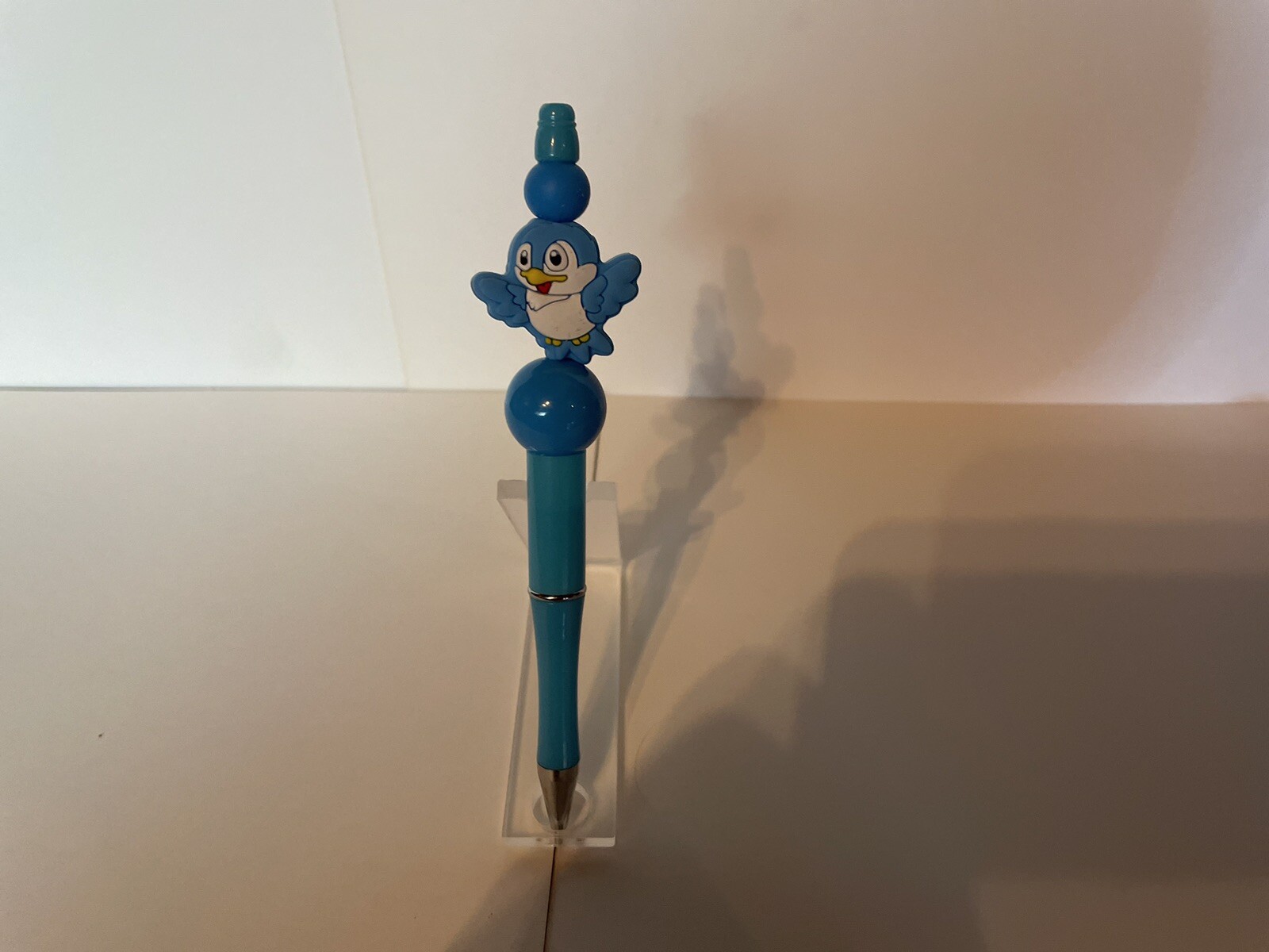 beaded pen,acrylic/or silicone beads. blue bird