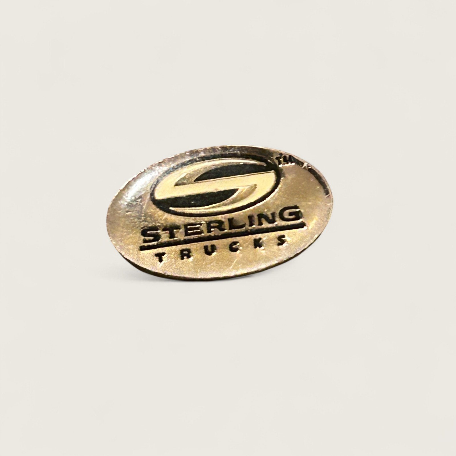 Sterling Trucks Lapel Pin Chrome Oval Logo Company Pin